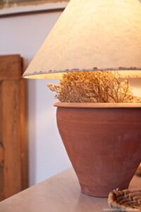 Warm lighting detail in Bougainvillea room, yoga retreat Crete Greece
