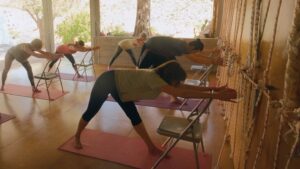 Iyengar yoga practice focusing on alignment and stability in a calm indoor space
