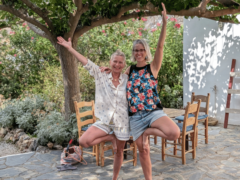 two guests smiling during a yoga retreat in Crete
